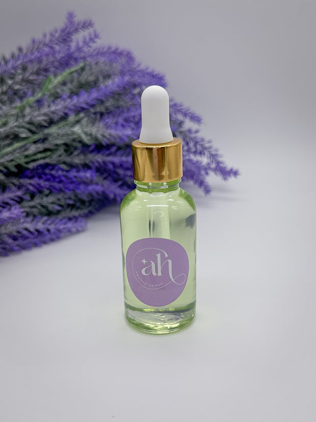 Glass bottles with droppers filled with Amarya Henna essential oils. The available oils are Cajeput, lavender, and eucalyptus