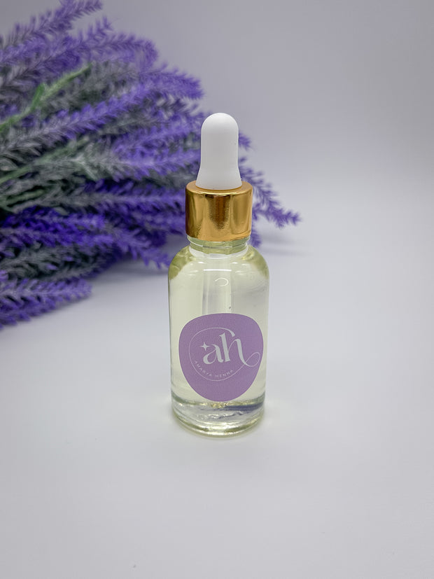 Glass bottles with droppers filled with Amarya Henna essential oils. The available oils are Cajeput, lavender, and eucalyptus