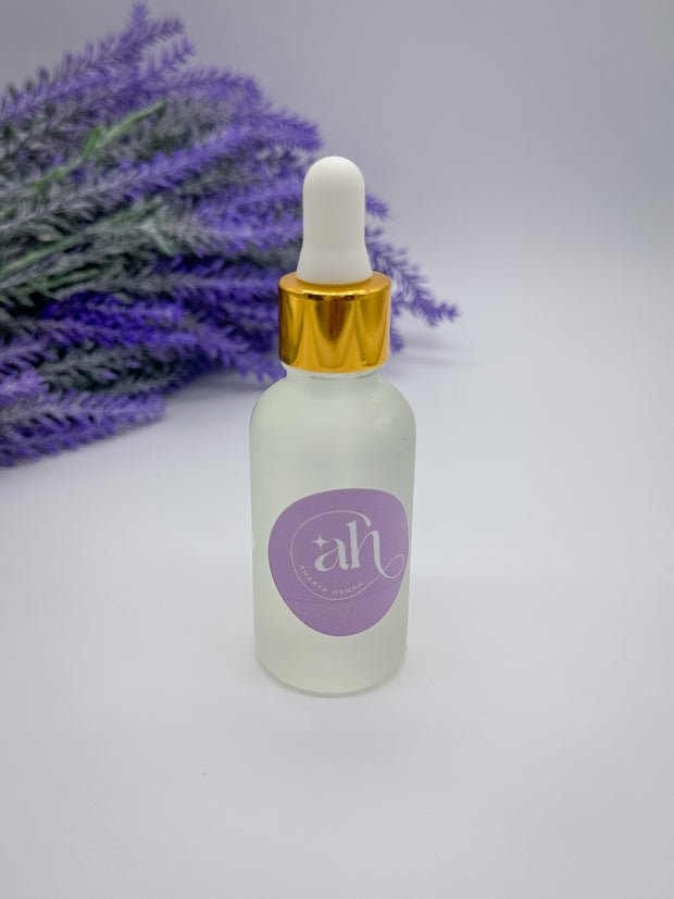 Glass bottles with droppers filled with Amarya Henna essential oils. The available oils are Cajeput, lavender, and eucalyptus