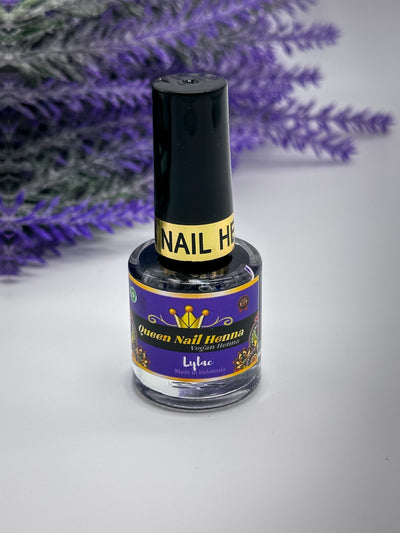 A bottle of Queen Nail Henna in Deep Lavender (Lilac) color with a black cap, placed against a white background with lavender flowers in the background. Sold by Amarya Henna