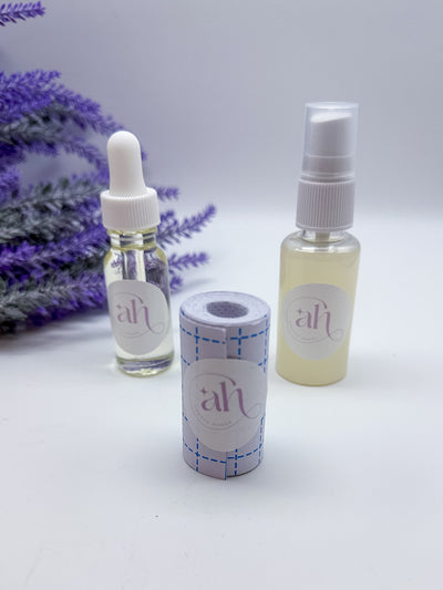 This image displays the Amarya Henna aftercare kit, which includes a clear lemon sugar sealant spray bottle, a roll of Mefix medical tape, and a small bottle of aftercare oil.