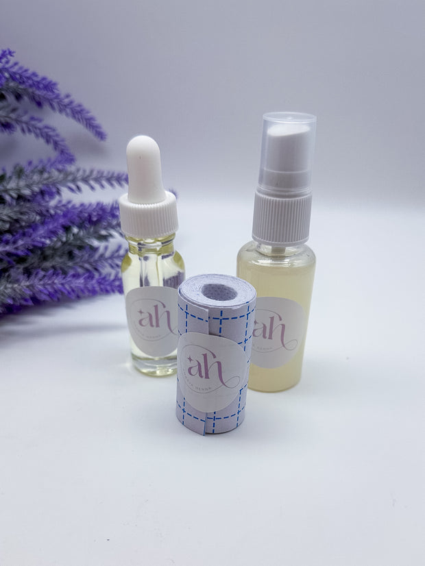 This image displays the Amarya Henna aftercare kit, which includes a clear lemon sugar sealant spray bottle, a roll of Mefix medical tape, and a small bottle of aftercare oil.