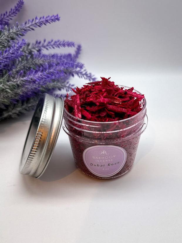 Handcrafted bakhoor incense by Amarya Henna, shown in packaging. Available in Dubai Rose, Cous Cous, and Halut scents, in 4oz and 8oz sizes.