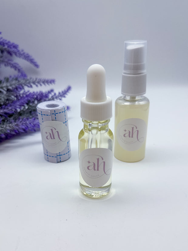 This image displays the Amarya Henna aftercare kit, which includes a clear lemon sugar sealant spray bottle, a roll of Mefix medical tape, and a small bottle of aftercare oil.