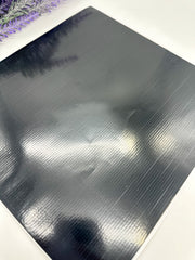 A strip of black pre-cut line tape for intricate designs by Amarya Henna 