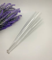 Rolled empty Cello Cones with a pin to keep them fresh and ready for intricate or bold designs by AmaryaHenna