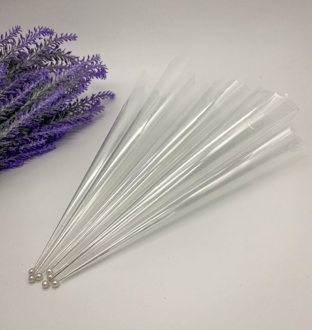 Rolled empty Cello Cones with a pin to keep them fresh and ready for intricate or bold designs by AmaryaHenna