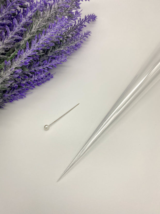 Rolled empty Cello Cones with a pin to keep them fresh and ready for intricate or bold designs by AmaryaHenna